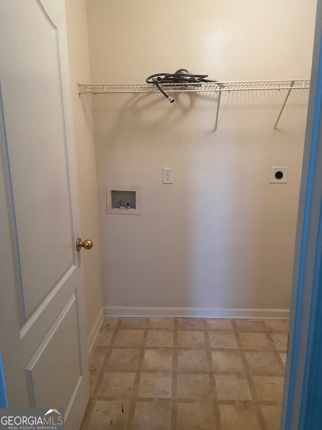 clothes washing area with hookup for an electric dryer and hookup for a washing machine