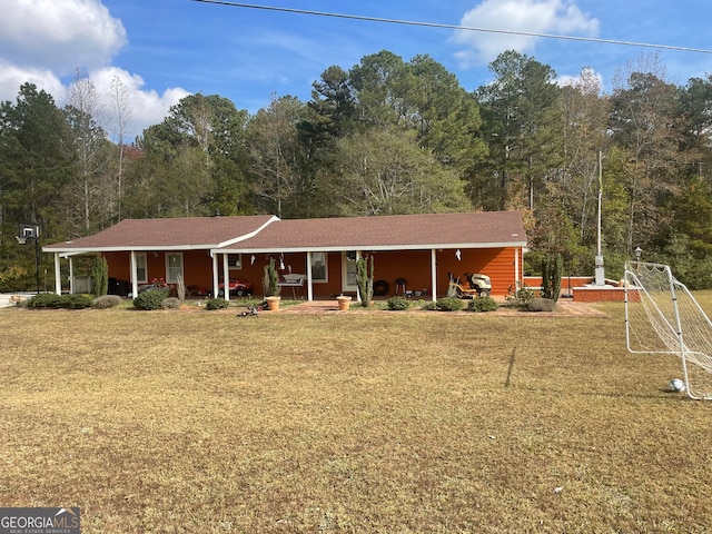 ranch-style house with a front lawn