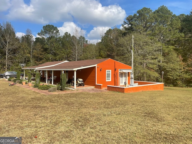 view of property exterior with a yard