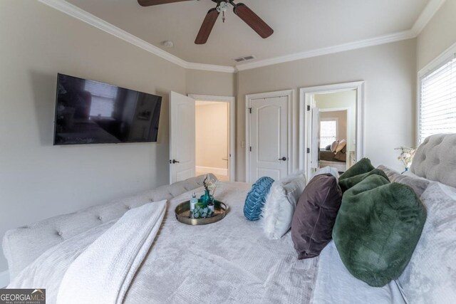 bedroom featuring ceiling fan and ornamental molding