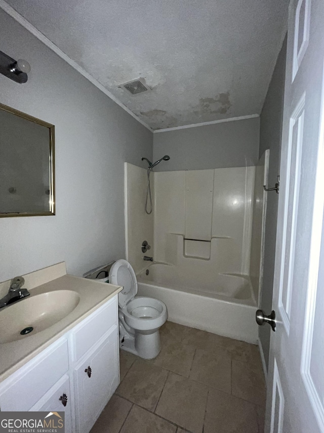 121-123 E King Ave, Kingsland, GA 31548 - bathroom featuring vanity, toilet, shower / tub combination, a textured ceiling, and tile patterned flooring