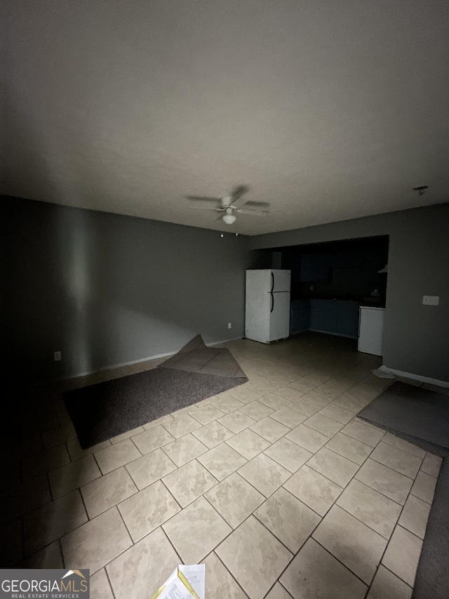 121-123 E King Ave, Kingsland, GA 31548 - unfurnished living room featuring light tile patterned floors and a ceiling fan