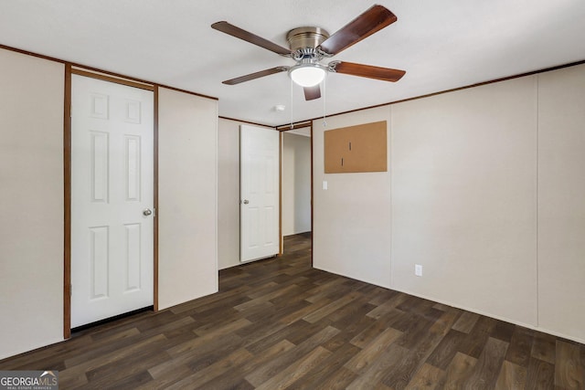 30 David Rd, Hinesville, GA 31313 - unfurnished bedroom with dark wood finished floors and a ceiling fan