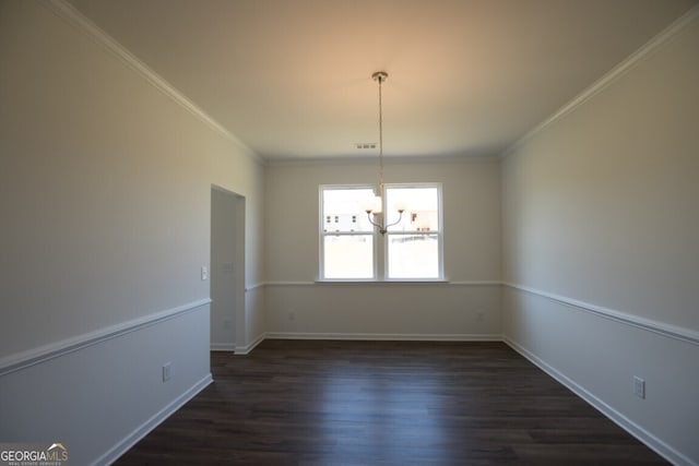 unfurnished room featuring ornamental molding, a chandelier, and dark wood-type flooring