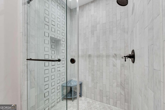 bathroom featuring an enclosed shower