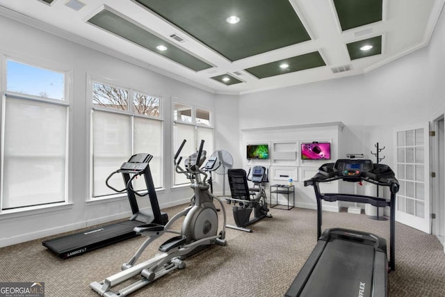 gym featuring carpet flooring, a high ceiling, coffered ceiling, and ornamental molding