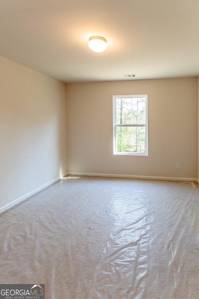 470 River Run Dr Unit 63, Dallas, GA 30132 - empty room featuring carpet floors and baseboards