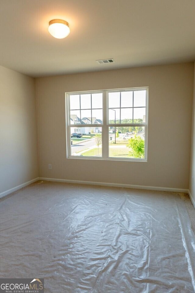 470 River Run Dr Unit 63, Dallas, GA 30132 - spare room with baseboards