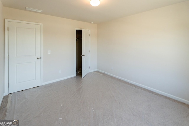470 River Run Dr Unit 63, Dallas, GA 30132 - unfurnished bedroom with carpet flooring, baseboards, and a closet