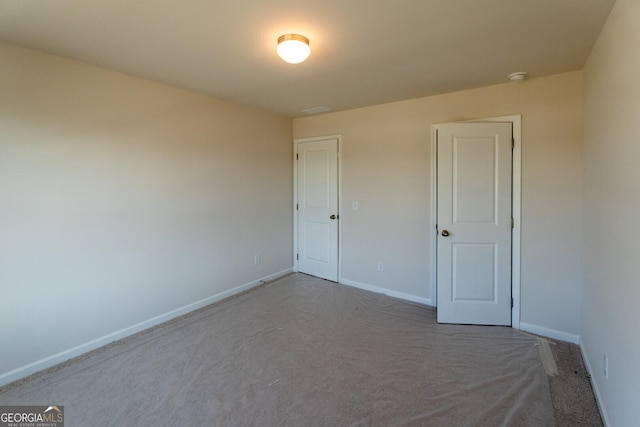 470 River Run Dr Unit 63, Dallas, GA 30132 - unfurnished bedroom featuring carpet floors and baseboards