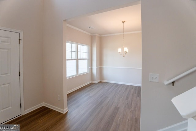 470 River Run Dr Unit 63, Dallas, GA 30132 - entrance foyer with wood finished floors, ornamental molding, a chandelier, and baseboards