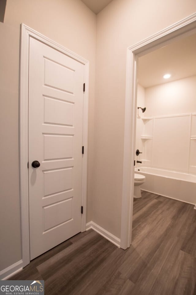 interior space with dark hardwood / wood-style flooring