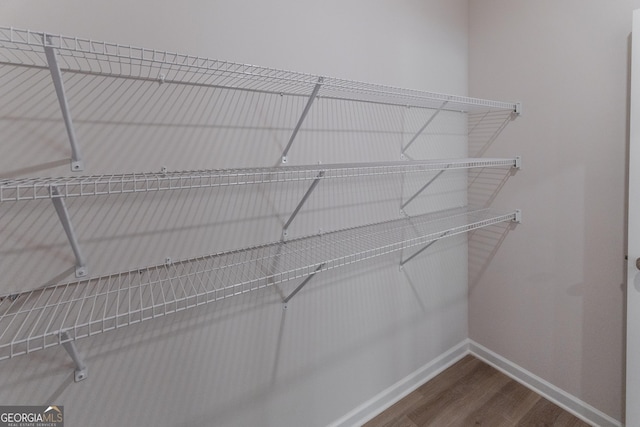 530 River Run Dr Unit 58, Dallas, GA 30132 - spacious closet with dark wood-type flooring