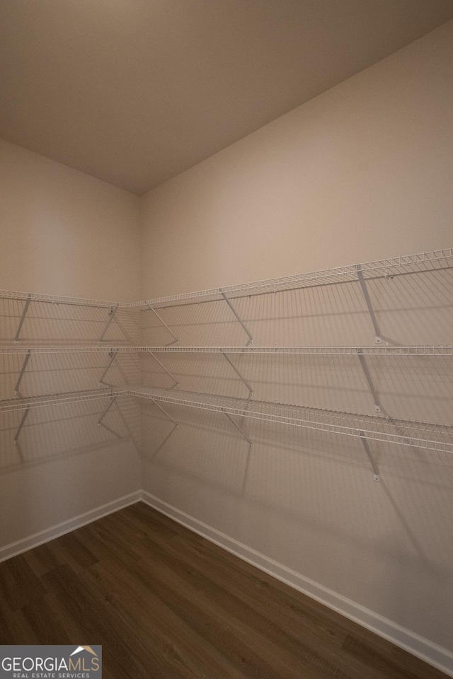 530 River Run Dr Unit 58, Dallas, GA 30132 - spacious closet featuring dark wood-style flooring