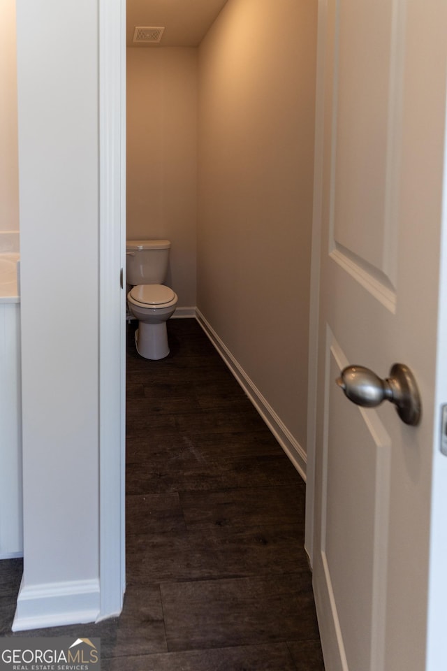 530 River Run Dr Unit 58, Dallas, GA 30132 - bathroom with toilet, wood finished floors, and baseboards