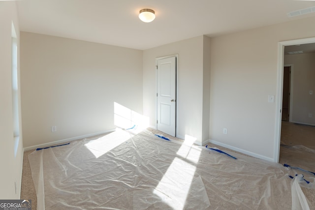 530 River Run Dr Unit 58, Dallas, GA 30132 - unfurnished bedroom featuring baseboards