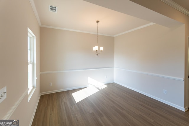 530 River Run Dr Unit 58, Dallas, GA 30132 - spare room with dark wood-style floors, baseboards, healthy amount of natural light, ornamental molding, and a chandelier