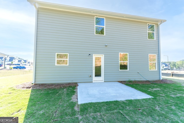 530 River Run Dr Unit 58, Dallas, GA 30132 - back of property featuring a patio and a lawn