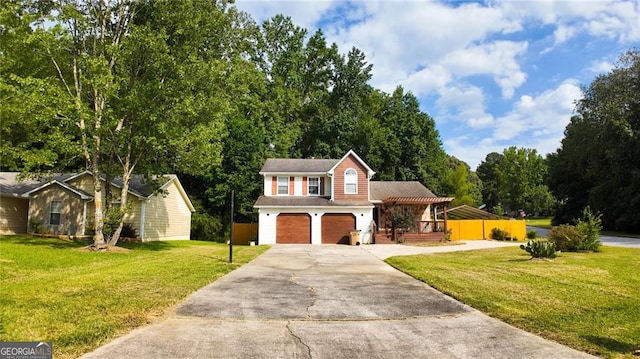 view of front of house featuring a front yard and a garage