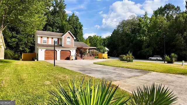 front facade with a front yard and a garage