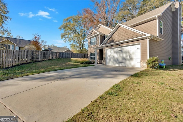 view of side of home featuring a lawn and a garage