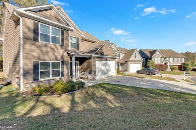 view of front of house featuring a garage and a front lawn