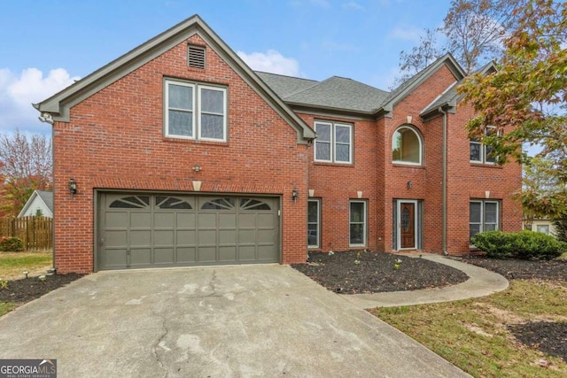 view of property with a garage