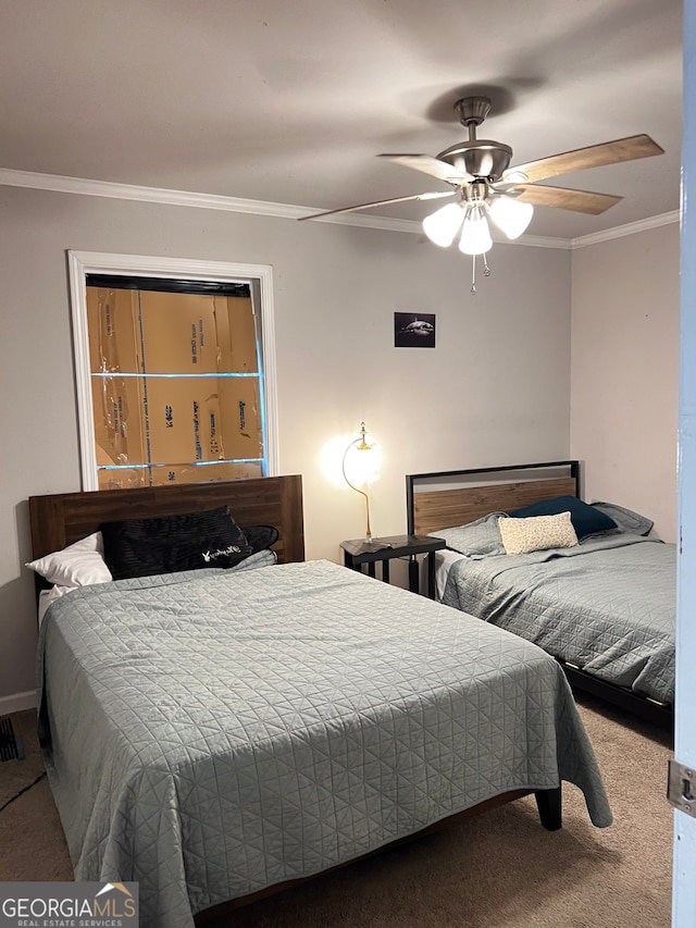 bedroom featuring ceiling fan, crown molding, and carpet