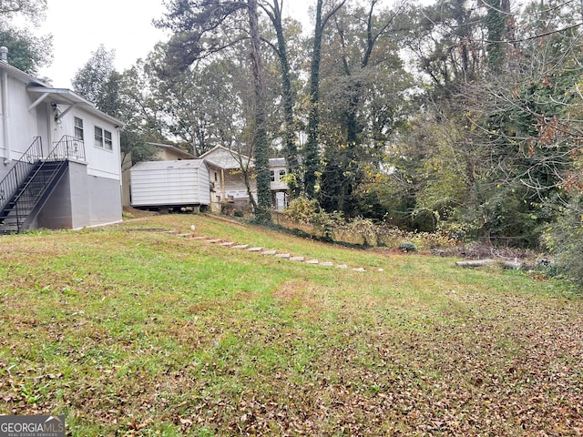 view of yard with stairs