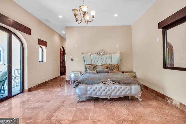 bedroom with an inviting chandelier and access to outside