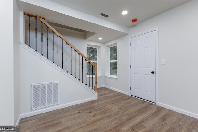 foyer with light hardwood / wood-style flooring