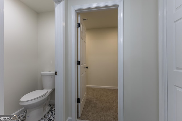 bathroom featuring toilet