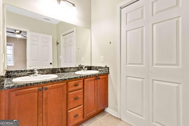 bathroom with vanity, ceiling fan, and tile patterned floors