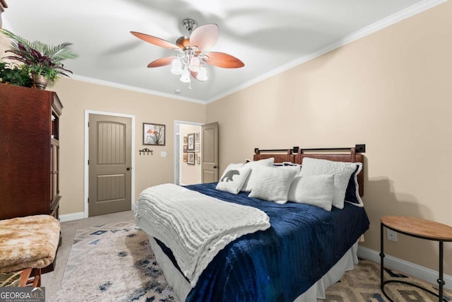 carpeted bedroom featuring ornamental molding and ceiling fan