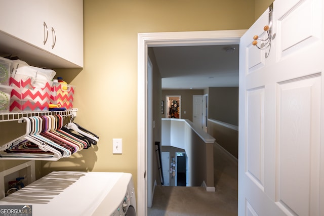 interior space featuring carpet flooring and washer / clothes dryer