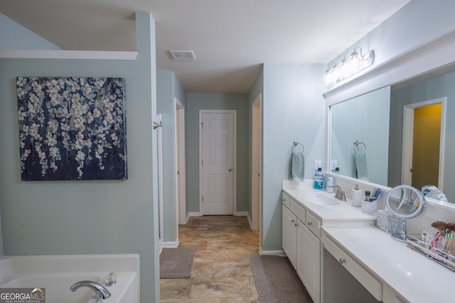 bathroom with vanity and a tub to relax in