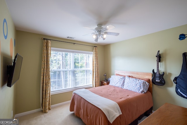 carpeted bedroom featuring ceiling fan