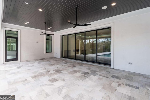 view of patio / terrace with ceiling fan