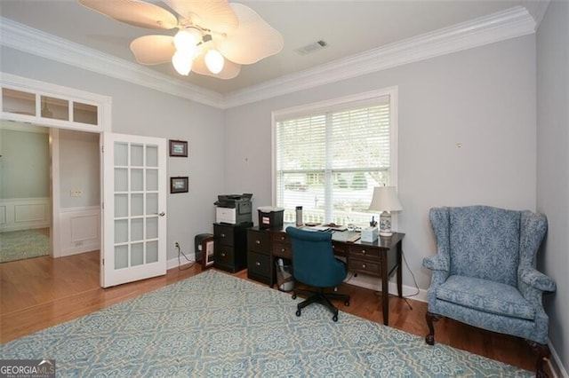 office with french doors, ceiling fan, crown molding, and hardwood / wood-style floors