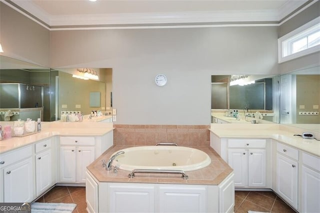 bathroom with vanity, crown molding, and separate shower and tub