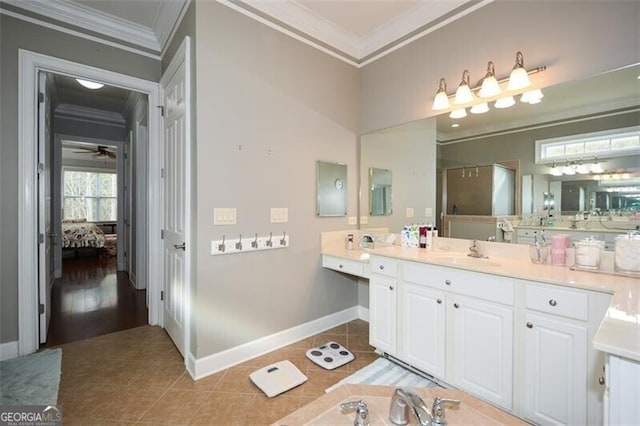 bathroom with vanity, crown molding, tile patterned flooring, and ceiling fan