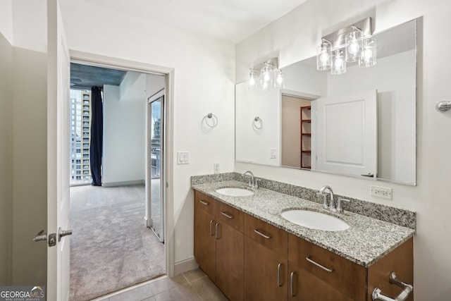 full bathroom featuring toilet, vanity, tiled shower / bath, and tile patterned floors