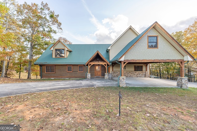 view of front of home with a carport