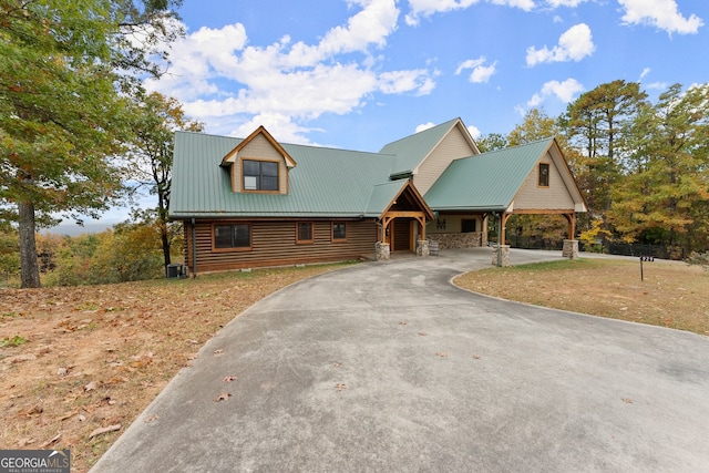 view of front of property featuring cooling unit