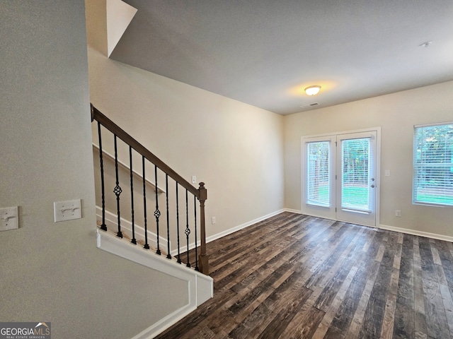 entrance foyer with dark wood-type flooring