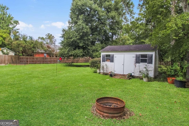 view of yard with a shed