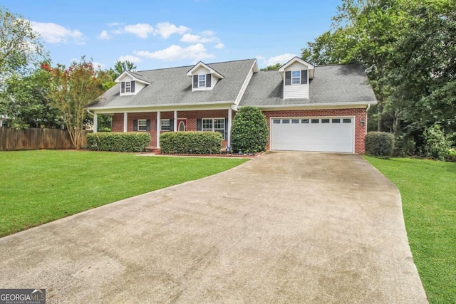 cape cod-style house featuring a porch and a front lawn