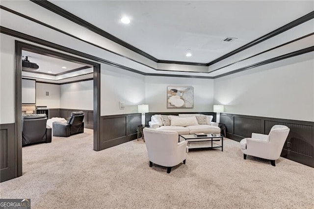 interior space featuring a tray ceiling and crown molding