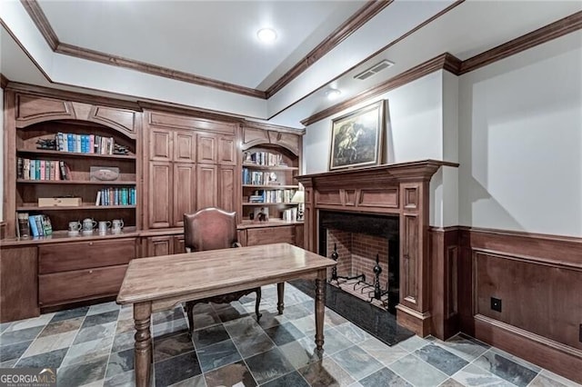 office space featuring built in shelves and ornamental molding