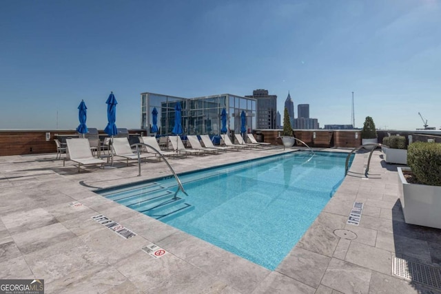 view of pool with a patio area